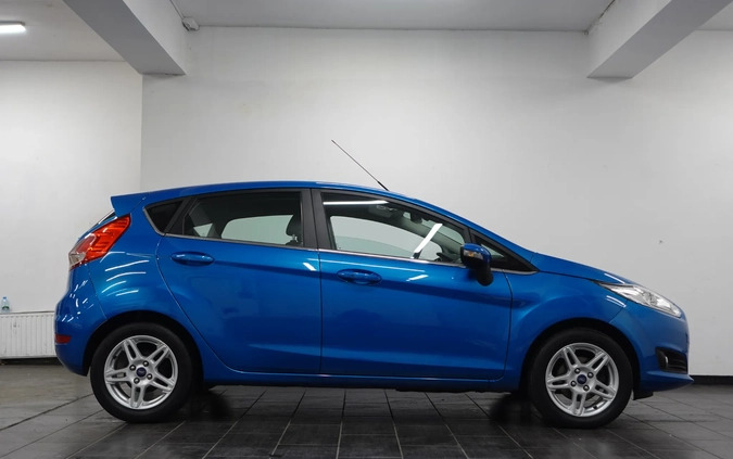 Ford Fiesta cena 26900 przebieg: 166556, rok produkcji 2013 z Wołów małe 781